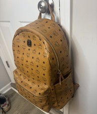 MCM cognac leather mcm logo monogram designer...