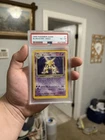 Pokemon TCG 1999 Base Set Alakazam Holo Rare 1/102 1st Ed PSA 4