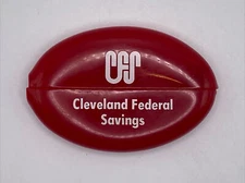 Vintage Quikoin Oval Squeeze Red Rubber Coin Holder "Cleveland Federal Savings"