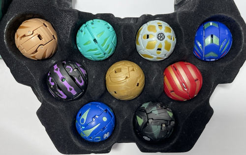BAKUGAN Battle Brawlers, estuche de hojalata con inserto; 21 bolas magnéticas y 66 cartas - EX - Imagen 4 de 14