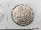 1880 8/7-O Morgan Dollar VAM G-A almost uncirculated/uncirculated