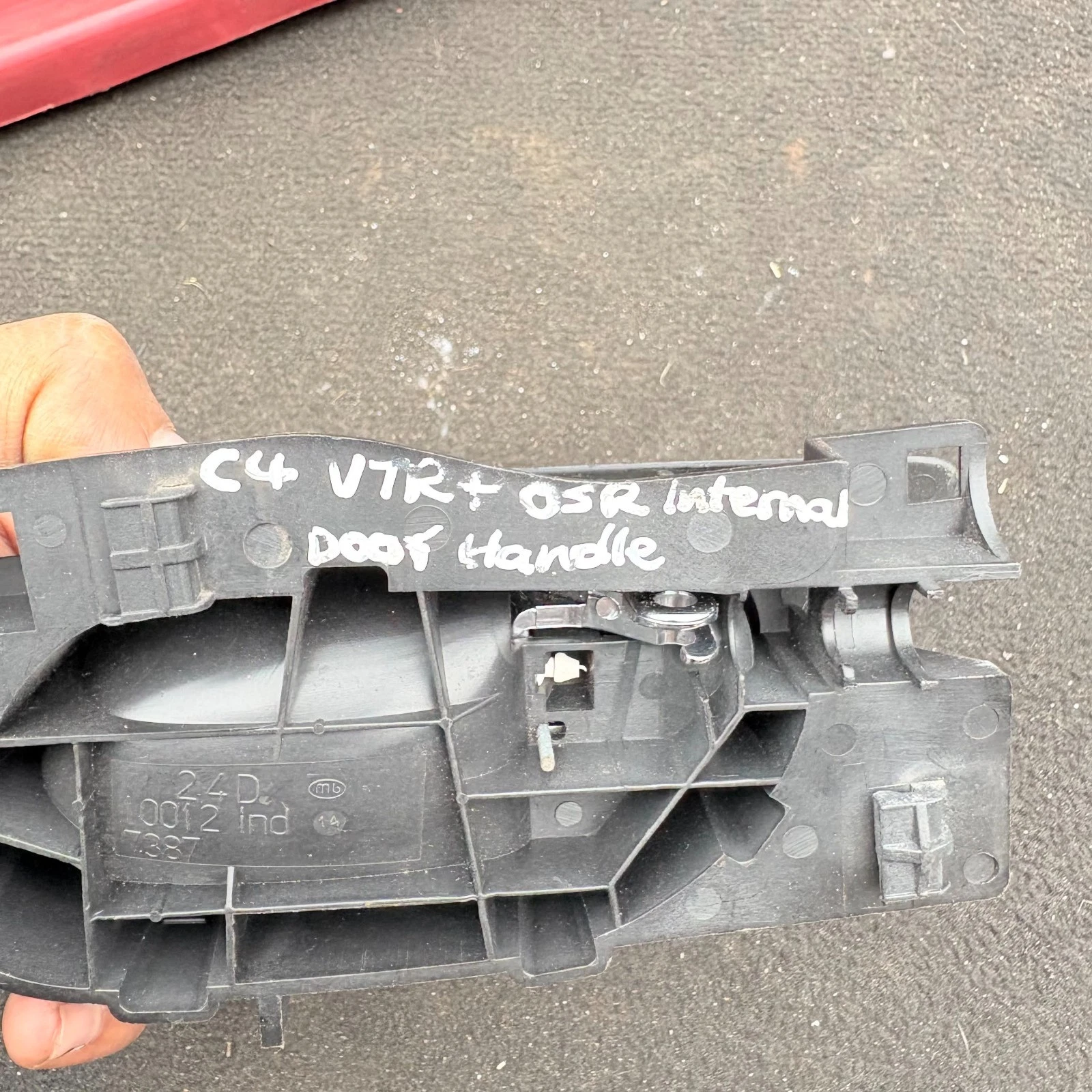 Actual handle marked C4 VTR plus OSR interior door handle