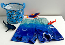 beach kit set includes bucket boys swim trunks size 6/7 and three toy sharks