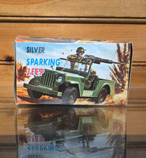 Vintage 3.5" Silver Chrome Sparking Jeep Wind up Toy Made in Japan
