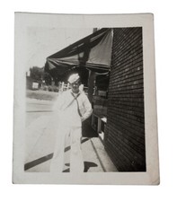 WW2 Era Photo U.S. Navy Sailor In White Uniform On Sidewalk by Building