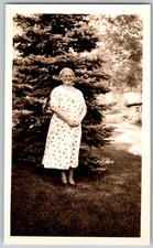 Vtg B&W Snapshot Elderly Smiling Woman Polka Dot Dress Pine Tree Glasses 1934