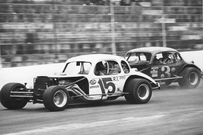 Bugs Stevens leads Fred DeSarro at a 1970s NASCAR Modified race Ma- Old Photo
