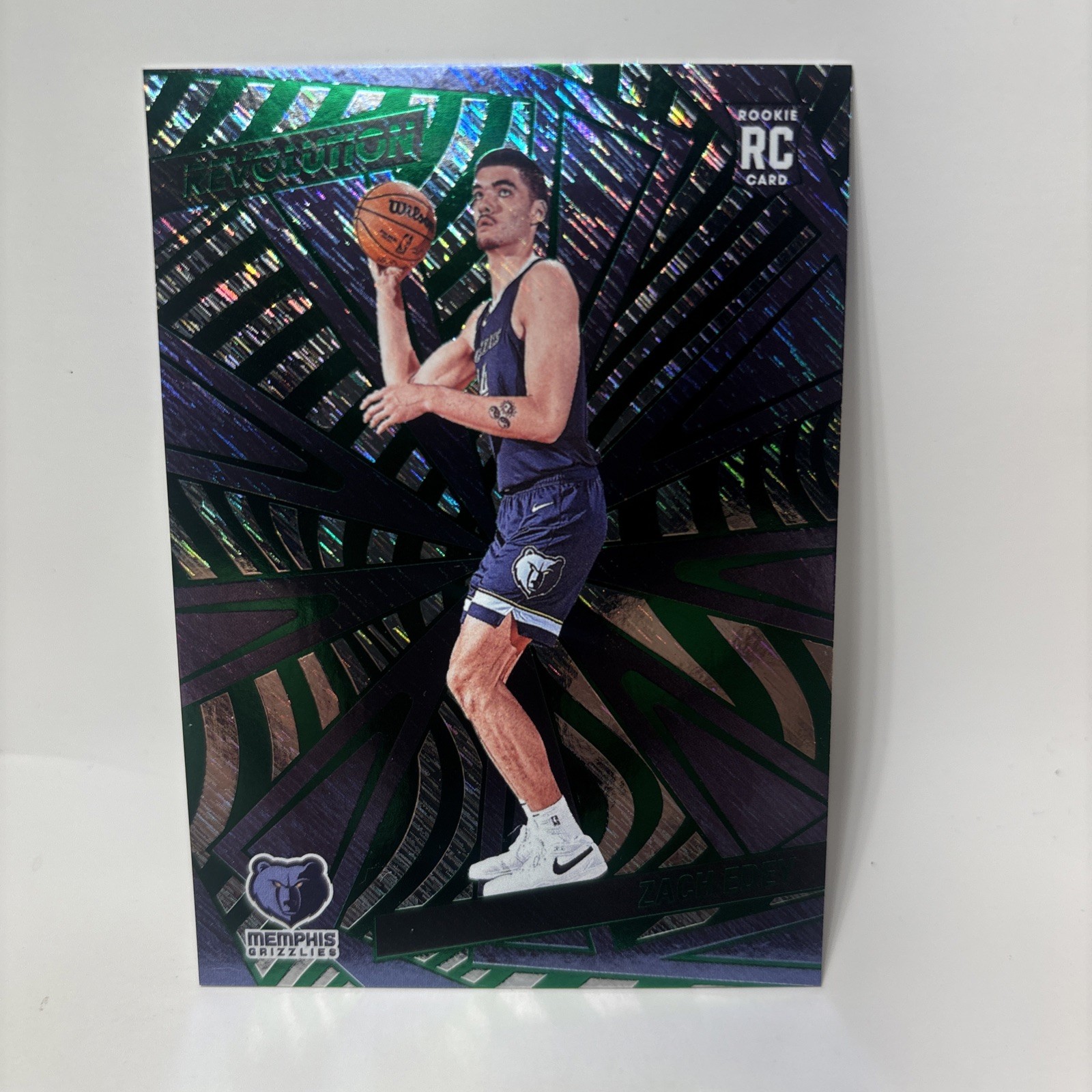 2024-25 Panini Revolution - Rookies Zach Edey #134 Green Storm /149 (RC)