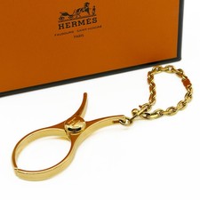 Hermes Filou Handschuhhalter goldfarbenes Met...