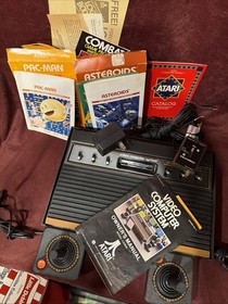 Atari CX 2600 Console 6-Switch Woodgrain PAC Man Asteroids Combat W Boxes A5