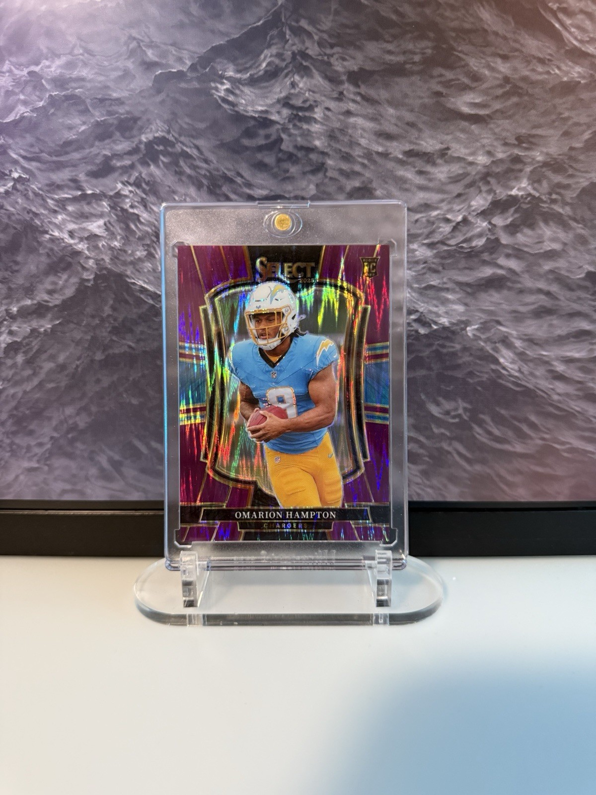 2025 Panini Select - Premier Level Omarion Hampton #102 Purple Shock Prizm /699