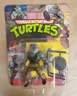 1988 Teenage Mutant Ninja Turtles Rocksteady 10 Back Playmates NIP