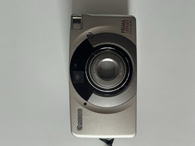 Canon Prima Super 105 Zoom X 35mm Film Point and Shoot Camera Silver Tested