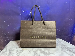 does gucci authenticate bolsas