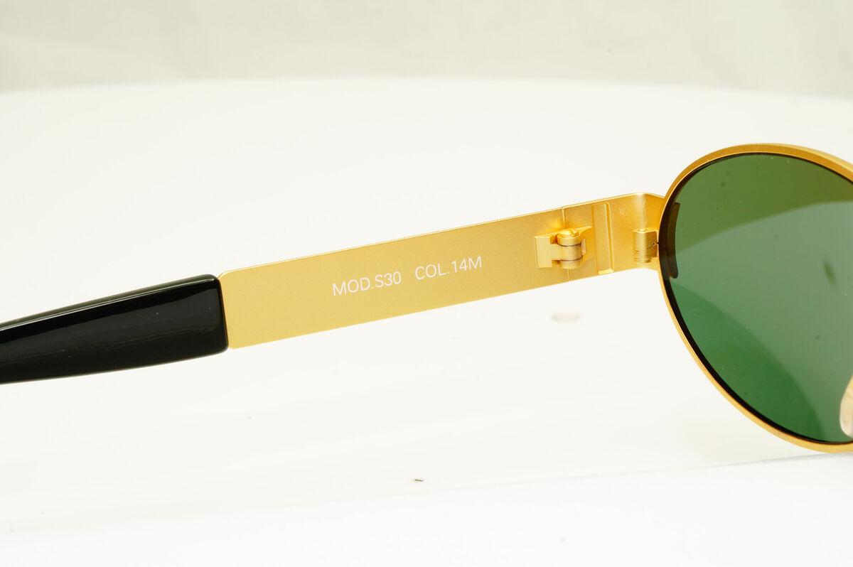 Gianni Versace 1996 Vintage Unisex Gold Oval Metal Gianni Versace 1996 Vintage Unisex Gold Oval Metal