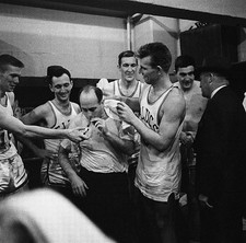 Happy shower drenched Red Auerbach coach of Boston Celtics has vict- Old Photo