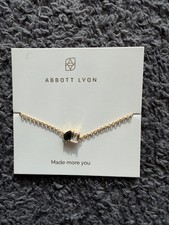 Abbott Lyon bracelet S/M (6-7 inch) coated in 18k gold with black-white stones