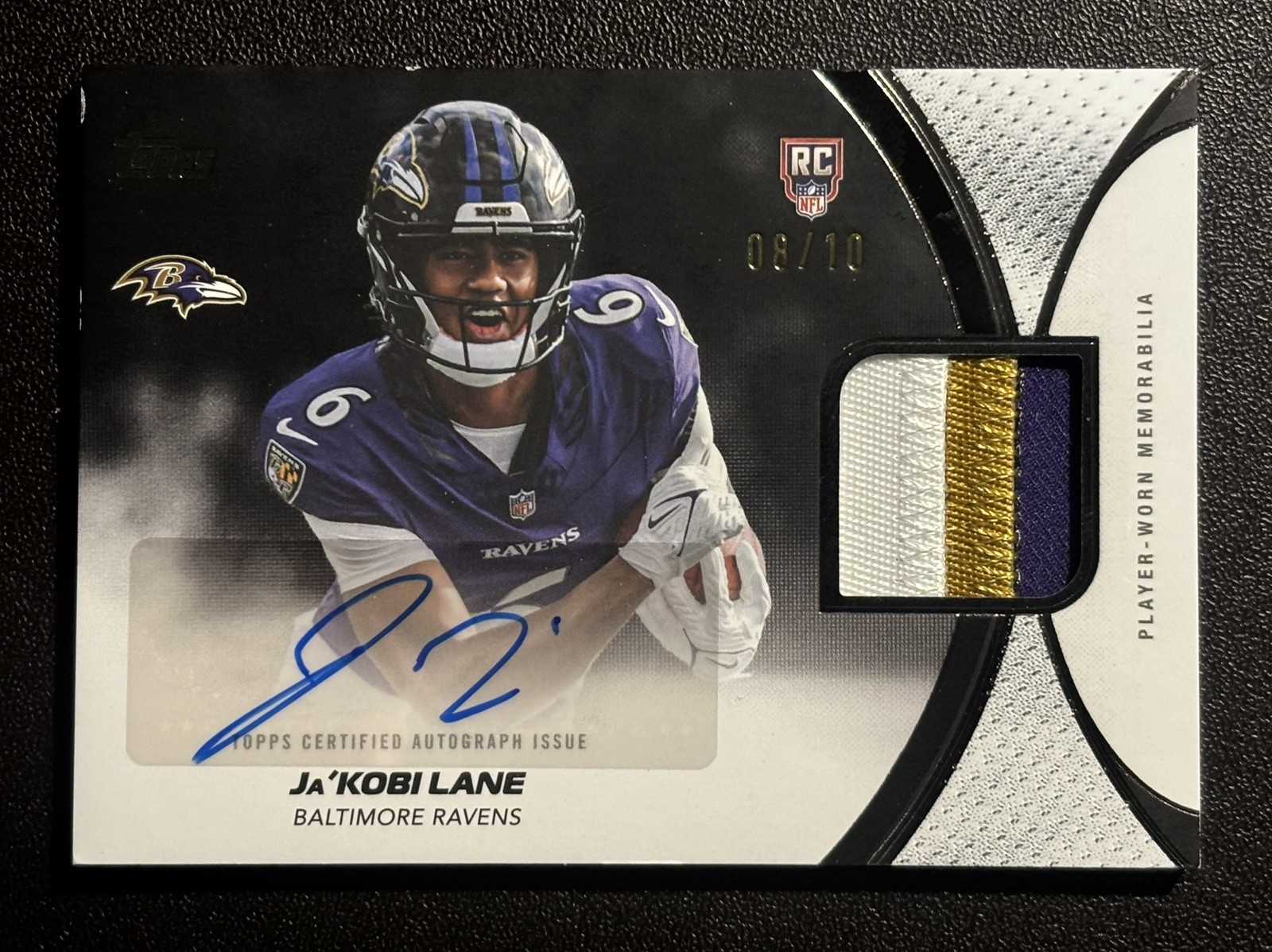 2026 Ja'Kobi Lane Topps Flagship Rookie Material Auto Patch Black /10 Ravens SSP view 2