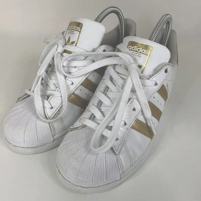 adidas gold stripe trainers