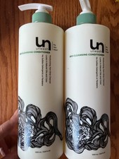 lot of 2 big 33.8 fl oz pump bottles unwash bio-cleansing conditioner