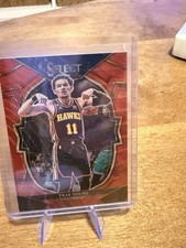 2022-23 Panini Select - Concourse Trae Young #66 Red Prizm