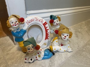 small porcelain clown dolls