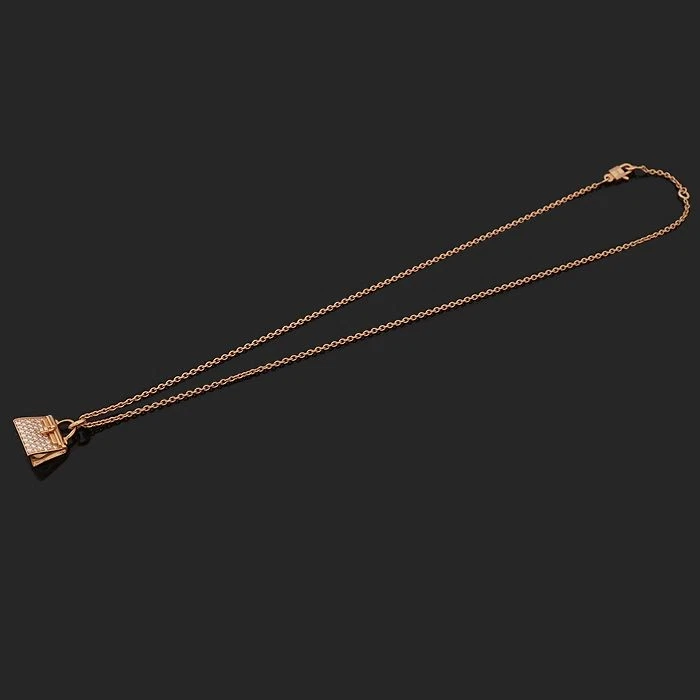 HERMÈS Collana con ciondolo Hermes H121310B oro rosa 18 carati 38P diamanti amuleti Kelly