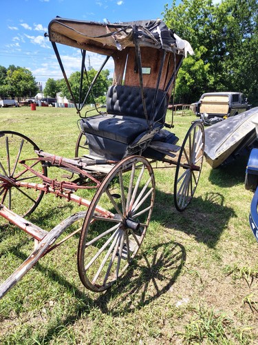 Traditional Horse-Drawn Carriage with Canopy and Wooden Spoked Wheels