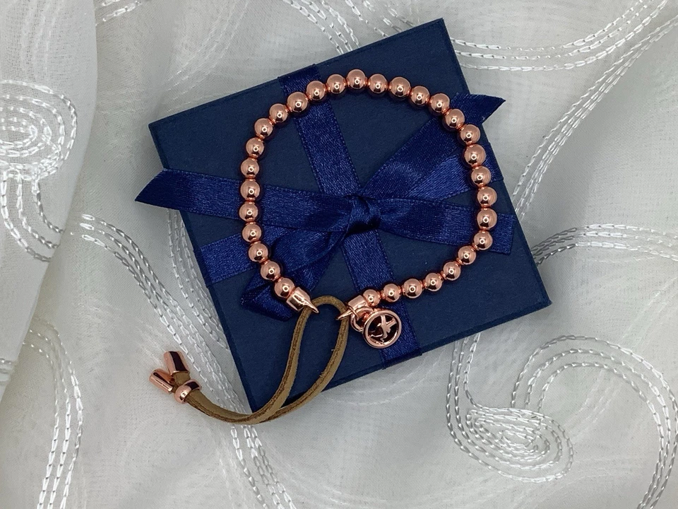 Pulsera elástica Michael Kors tono oro rosa con cuentas Foto 3 de 4
