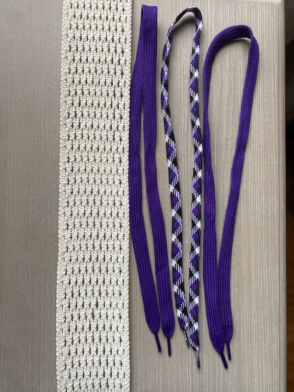 Lacrosse Mesh Hard With Shooting strings.   White And Purple