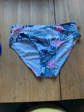 Bikini bottoms and a cover up size 11-12 Years