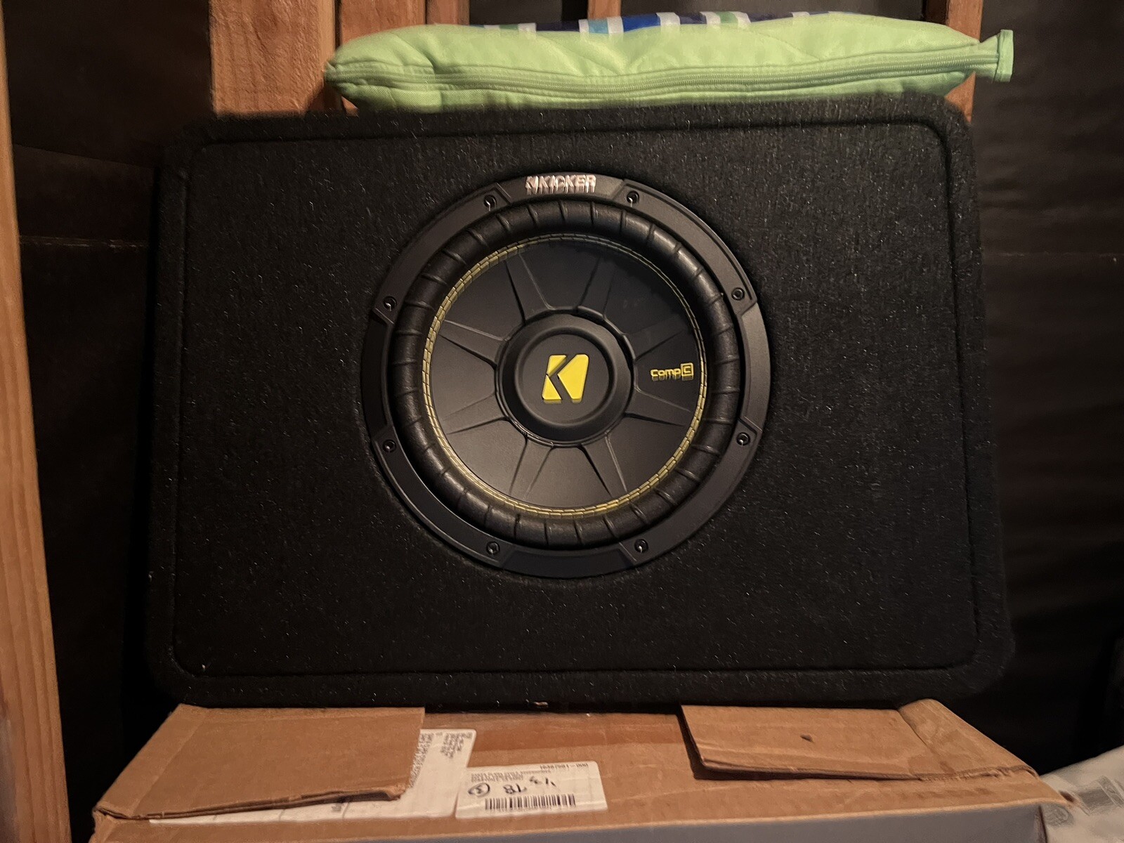 10-inch Kicker Comp C subwoofer in a durable enclosure-image
