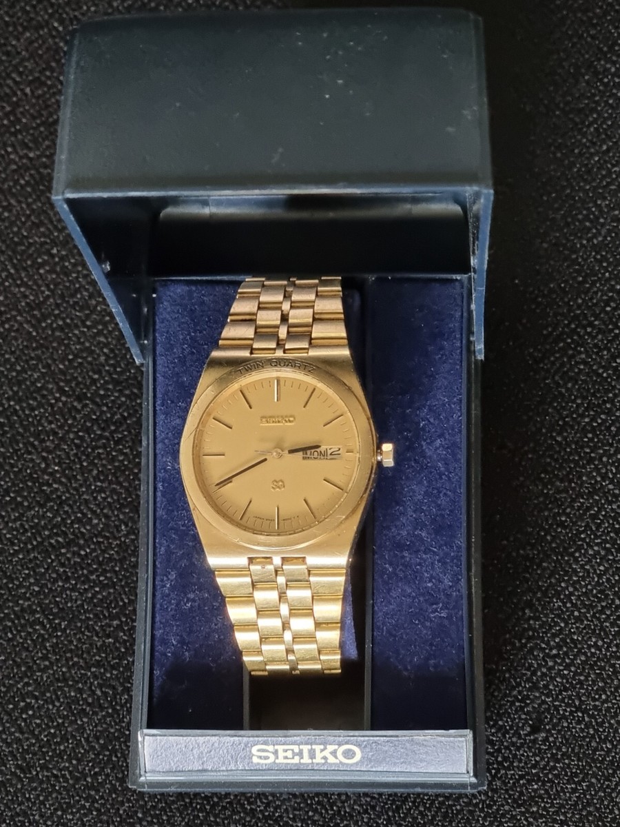 SEIKO 9923 8000 TWIN QUARTZ WATCH CHAMPAGNE GOLD DIAL SS STRAP A