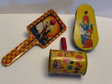 Three Vintage 1950's Tin Noise Children Toy Noise Makers