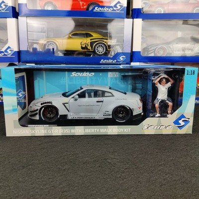 SOLIDO NISSAN GT-R35 LIBERTY WALK BODY KIT 2.0 GRAU + CATO FIGUR 1:18 NEU