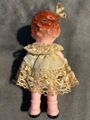 Vintage 1940s Knickerbocker Hard Plastic Girl Doll in a Lacy Dress 
