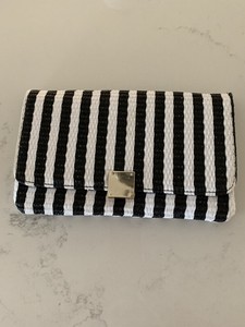 black and white striped clutch bag