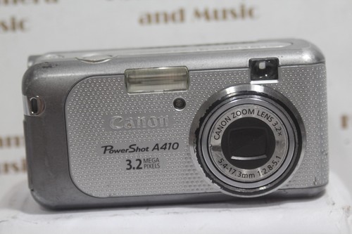 Canon PowerShot A410 Digital Camera parts repair good power+batt door /LensError