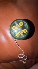 Vintage Yomega "Brain" yo-yo featuring a clear plastic body  Yellow 2 Inches