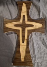 A wall hanging all wooden cross from Christianity size 11" up & down  7" across