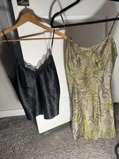 LOT OF 2 ITEMS Both Victoria s Secret. Black Vintage Golden Tag. Green Slip