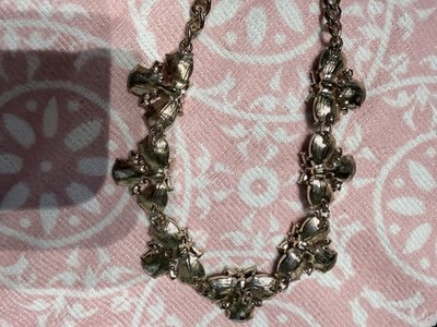 Antiqued gold-tone base metal attached to a chunky link chain, 18 