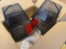 Lancia Delta Integrale Rear Light Covers Tint Black With Stainless Screws Kit.