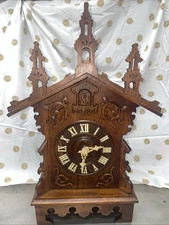 Antique Mantle Cuckoo Clock 24”tall 15”wide 9” deep super nice clean Clock.