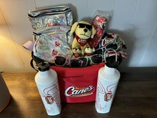 Raising Cane’s Ultimate Swag Bag Brumate Water Bottles Hats Fanny Packs And More