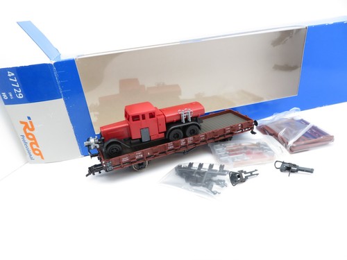 360H0 /4 - Roco H0 47729 - Rungenwagen braun DRG mit Feuerwehr - top in OVP | Condition: Gebraucht