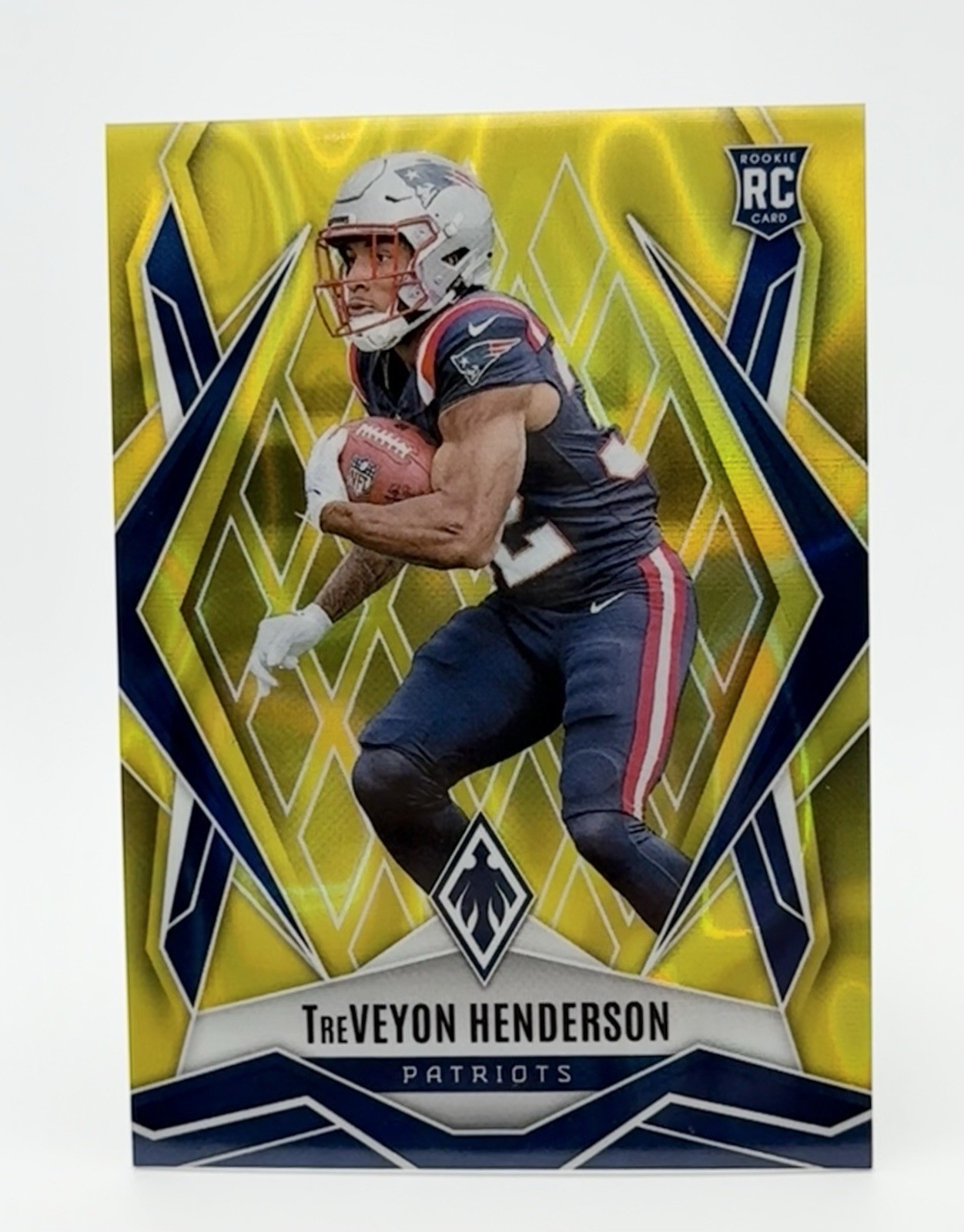 2025 Panini Phoenix - Rookies TreVeyon Henderson #187 Yellow Lava /125 (RC)