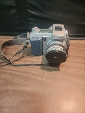 Minolta Dimage 7, 5.2 MP digital camera 7x optical zoom shoulder strap included