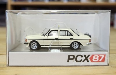 PCX87 1:87 1007994 Mercedes-Benz W123 AMG Taxi. Neu-OVP