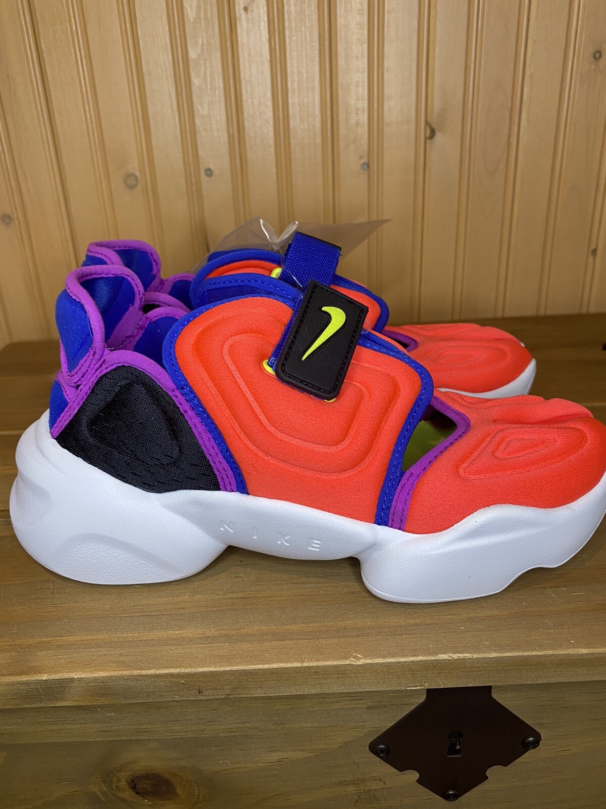 tenis da nike amarra sozinho